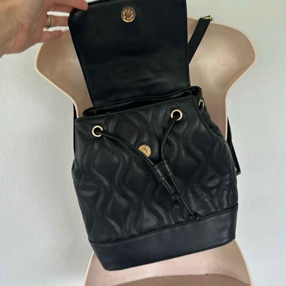 Alexis Bendel black quilted vegan leather adjustable backpack
